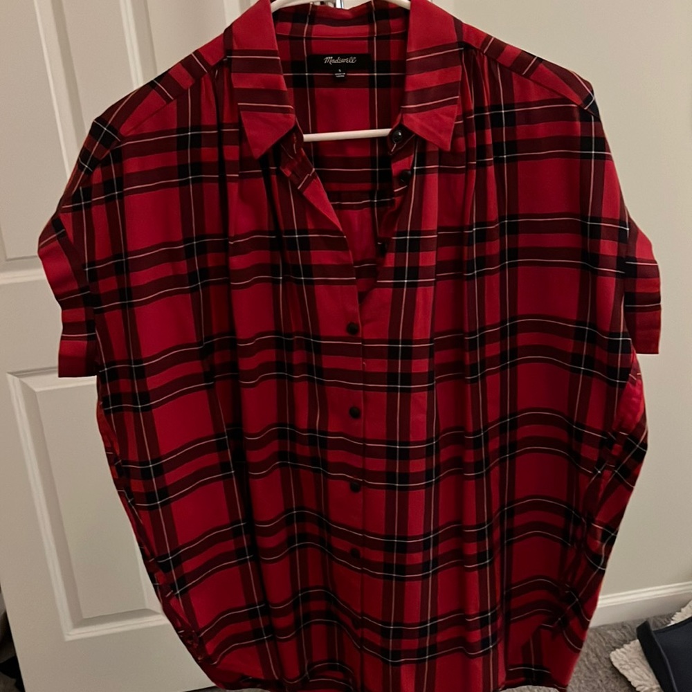 Boxy short sleeve flannel style button up.